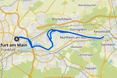 Eine Karte zeigt eine blaue Routenlinie, die in Frankfurt am Main beginnt, durch Dörnigheim, Mühlheim am Main und Kesselstadt verläuft und schließlich ihr Ziel in Steinheim erreicht. Die Route durchquert verschiedene Vororte mit beschrifteten Orten.